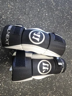 Used Warrior RABIL NEXT Lacrosse Arm Pads/Guards Black Youth