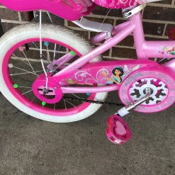 Used Huffy PRINCES 16 IN TRAINING BIKE Training Wheel Bike Girls Pink 16"