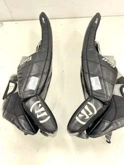 Used Warrior RITUAL G4 Goalie Leg Pads Junior Black 28